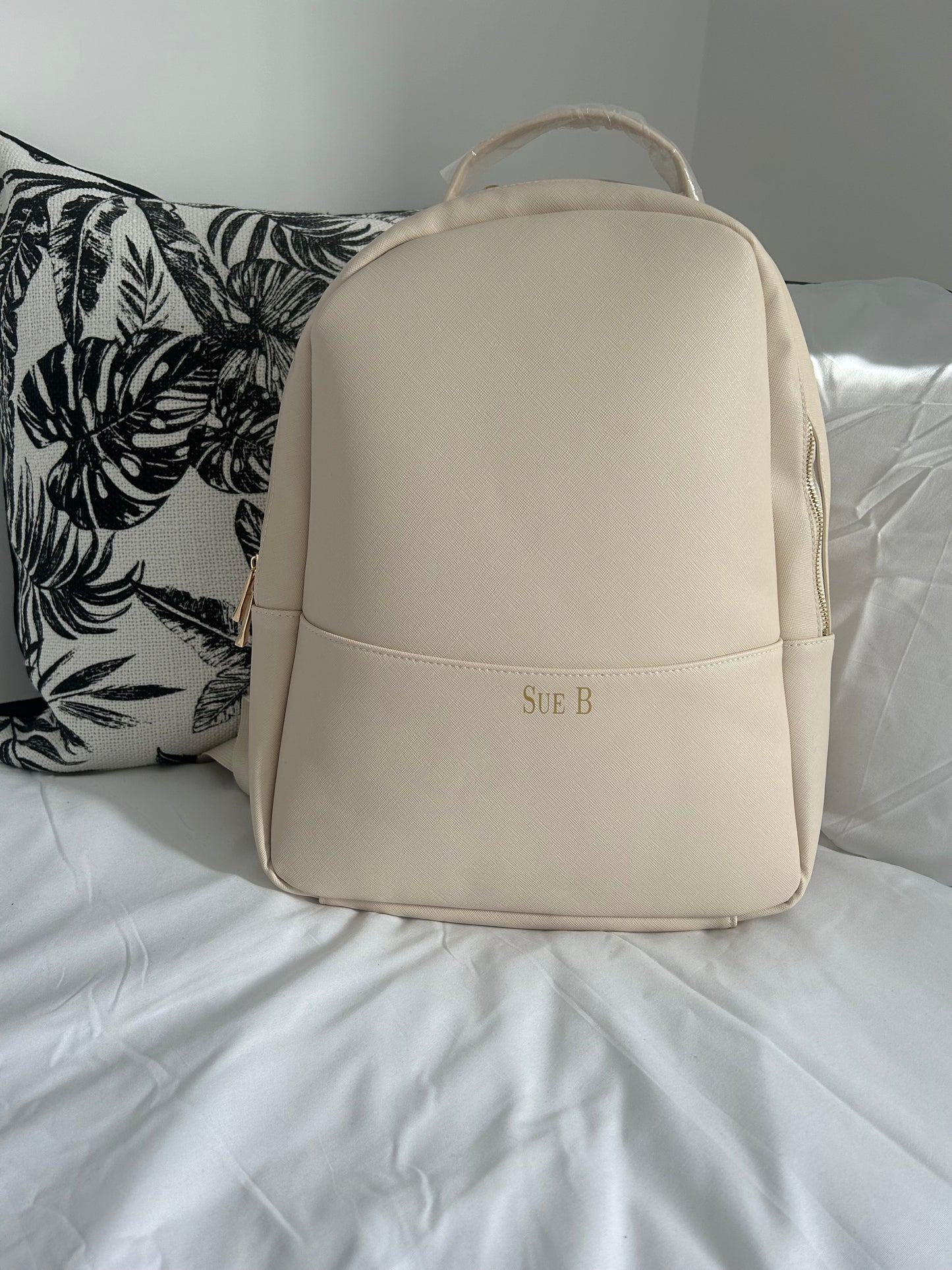 Monogrammed backpack.