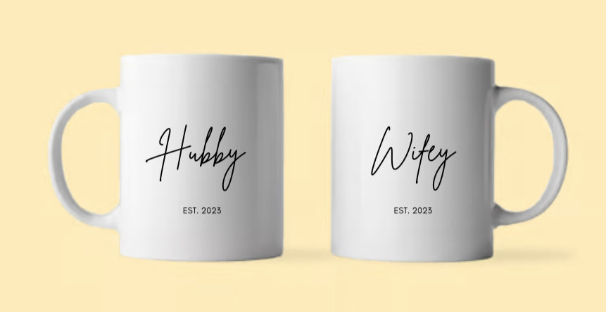 Set of 2 worded mugs.