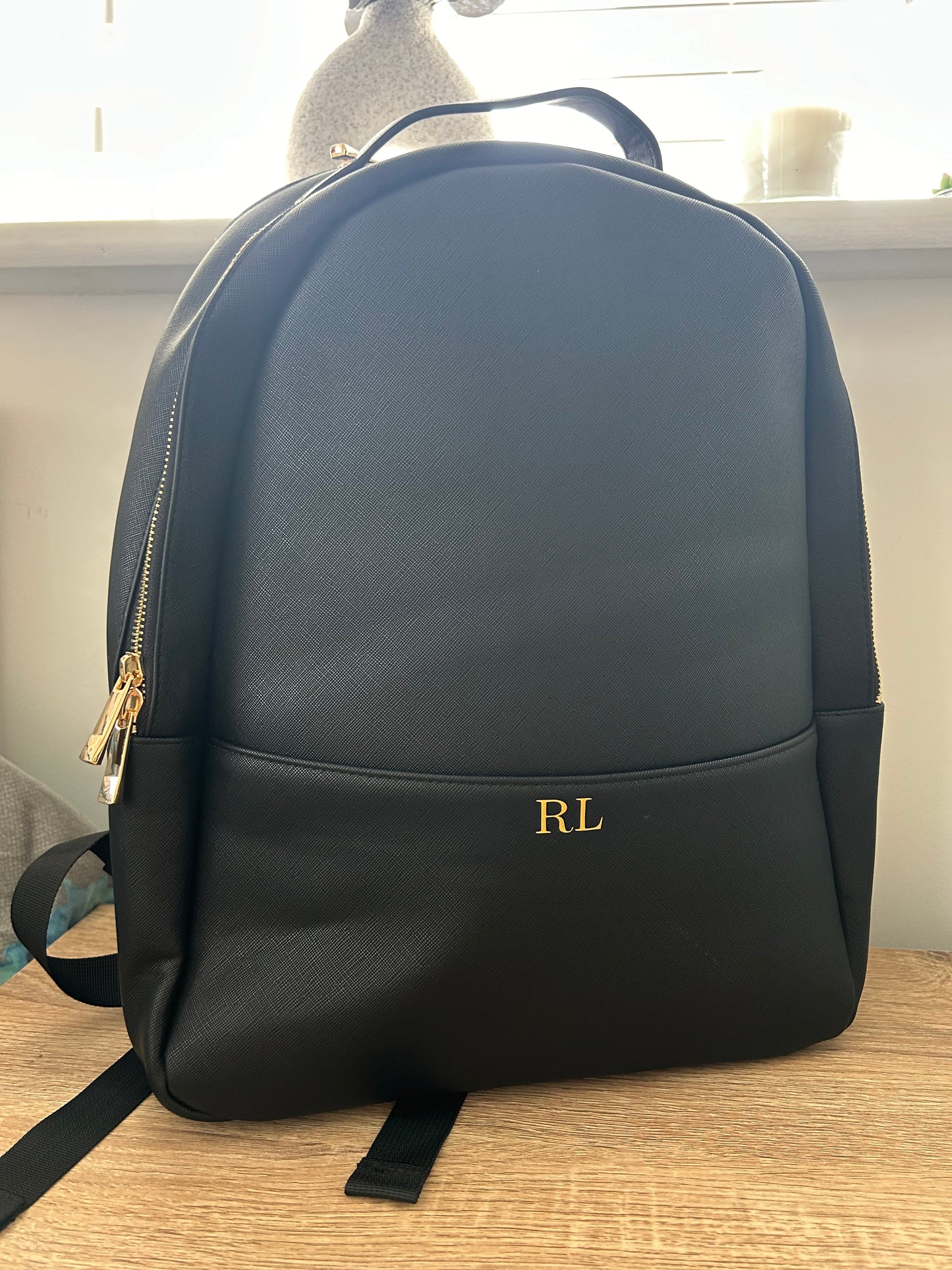 Monogrammed backpack.