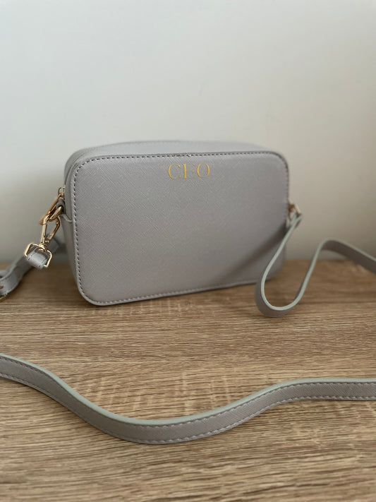 Monogrammed box cross body bag.